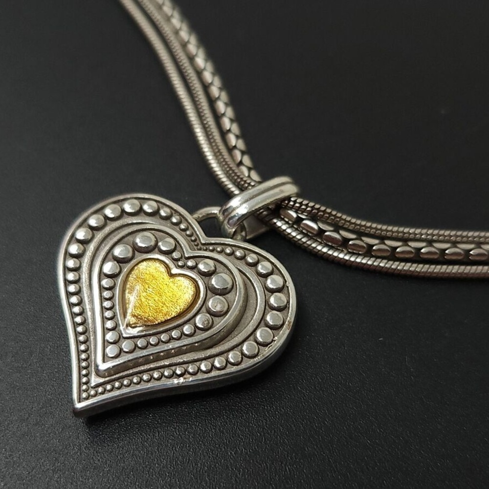 Vintage Brighton silver two tone heart pendant. 17”
